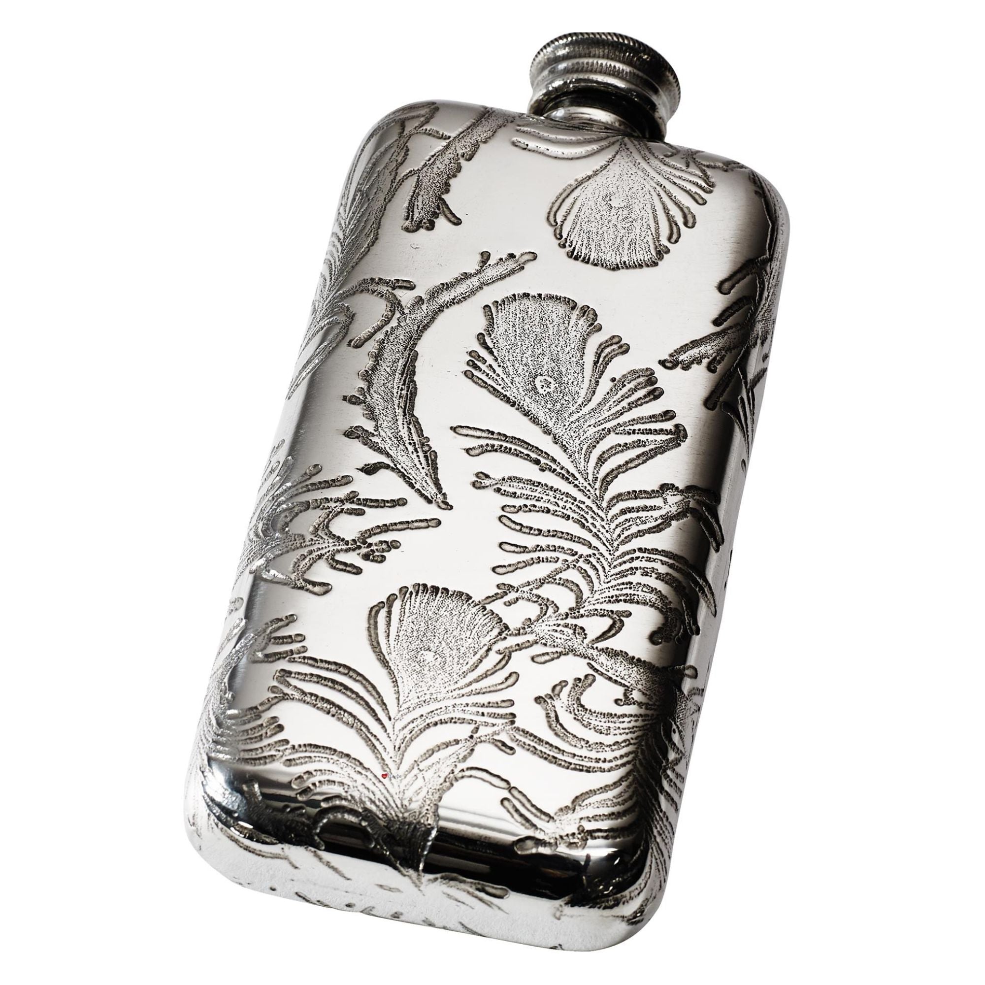 Silver flask with intricate floral engraving on a white background