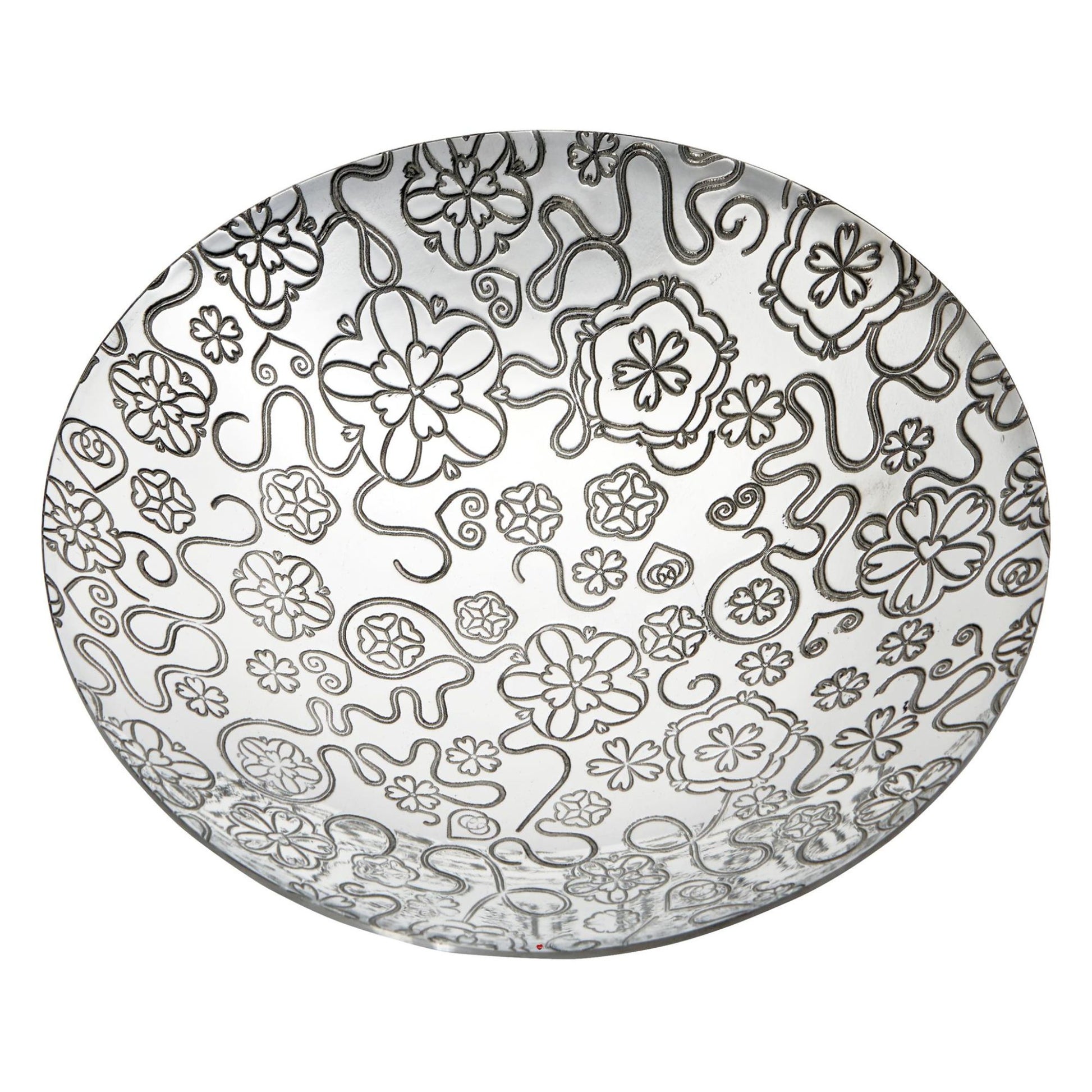 Decorative plate with black floral and abstract patterns on a white background
