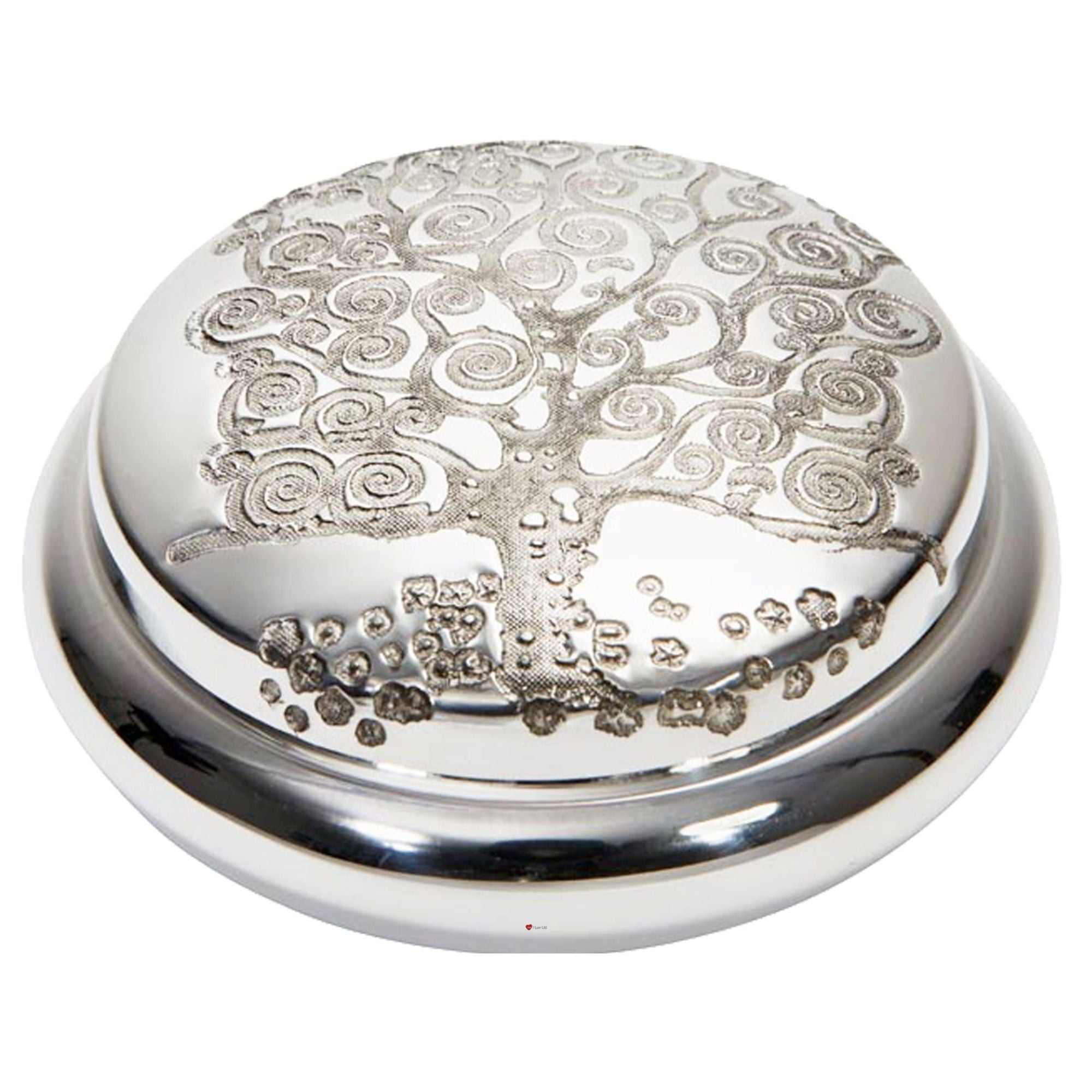 Silver decorative object with tree of life design on a white background