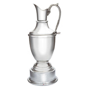 Silver pitcher on a white background