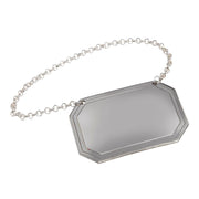 Hexagonal mirror with a chain on a white background